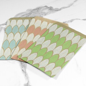 paper merchandise bags with leaf print design