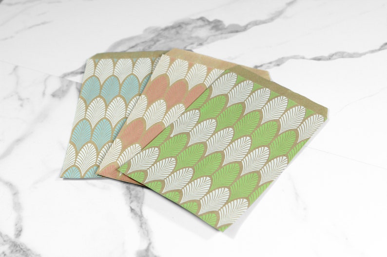 paper merchandise bags with leaf print design