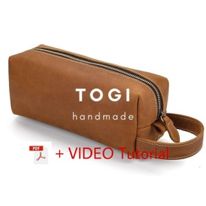 May include: A brown leather zippered pouch with a handle. The pouch has the text "TOGI handmade" printed on it. The image also includes a PDF icon and the text "VIDEO Tutorial".