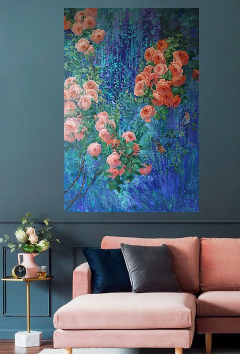 May include: A rectangular wall art print featuring an oil painting of vibrant peach-colored roses and green foliage set against a deep blue, textured background. Two small birds are perched among the rose branches in this detailed floral artwork.