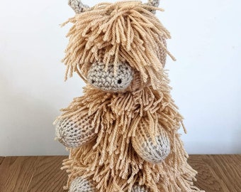 Baby Highland cow Knitted and crocheted doorstop shelf sitter