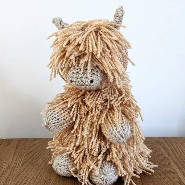 Baby Highland cow Knitted and crocheted doorstop shelf sitter