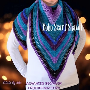 May include: A handmade, colorful crochet shawl in shades of teal, purple, and black. The shawl is triangular, with a textured pattern and the words "Boho Scarf Shawl" in white. The text "Advanced Beginner Crochet Pattern" is also visible.