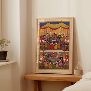 May include: A framed illustration depicting a scene from Ottoman history. The artwork features a group of people gathered around a table, with a colorful tent overhead. The illustration is painted in a vibrant style with intricate details.