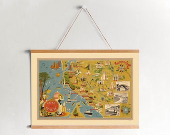 May include: A vintage illustrated map of the French Riviera, known as the "Cote d'Azur", with a yellow background and blue ocean. The map features various landmarks and towns along the coastline, including Nice, Cannes, and Saint-Tropez. The map is framed in a light wood frame.