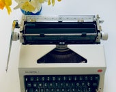 Like New, Olympia SM9 typewriter, De Luxe QWERTY, 1973, Superb Working Condition, Very Clean, with Case and Manual, Made Germany