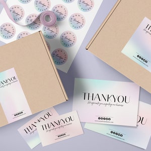 May include: A set of thank you cards and stickers with a holographic rainbow design. The text on the cards and stickers reads "THANKYOU We appreciate you supporting our business".