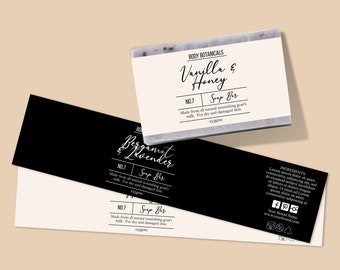 May include: Two soap bar labels with black and white text. The top label is for Vanilla & Honey soap bar, and the bottom label is for Bergamot & Lavender soap bar. Both labels are made from all natural nourishing goat's milk. Each bar is 25 grams.