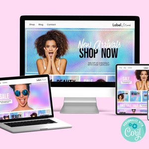 May include: A computer screen, laptop, tablet, and smartphone all display a website with a holographic background. The website is for a company called "Label.Mort" and features a sale on beauty products. The text on the website says "New Arrivals SHOP NOW" and "15% off at checkout with code LADYLUCK".