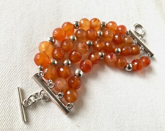 Four row Faceted Orange Carnelian Agate stone and Silver Bracelet 7”