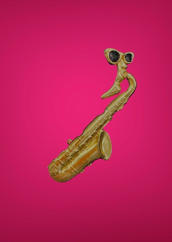 Vintage Musician playing Saxophone Gold tone 2.6” 