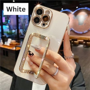 Étui de téléphone avec support à paillettes pour iPhone 15 14 13 12 11 Pro Xs Max Mini SE X XR 7 8 6 Plus, coque avec anneau en métal et cristal avec placage de luxe
