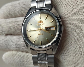 Zegarek vintage Orient z beżową tarczą, zegarek orientalny z 3 gwiazdkami, ośmiokątny Orient, zabytkowe japońskie zegarki, beżowa tarcza Orient