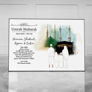 May include: A watercolour illustration of a family of four standing in front of the Kaaba in Mecca, Saudi Arabia. The image is a celebration of the Umrah pilgrimage, with the text "Umrah Mubarak" and the date "March 2024 | 1445 AH". The text also includes the names "Humera, Shakeel, Ayaan & Sofia" and a message wishing them blessings on their journey.
