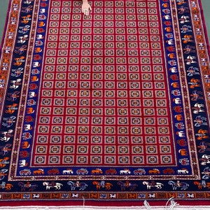 9’9” x 7’ ft Unique Turkmen rug with antique design. Pazyryk pattern with horses on the borders.  Soft and shining pure wool. Area rug.