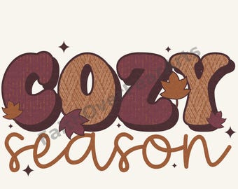 Puede incluir: Un diseño gráfico con el texto 'cozy season' en una fuente gruesa y superpuesta. La palabra 'cozy' tiene un relleno texturizado marrón y granate oscuro con un contorno oscuro, acentuado por pequeñas hojas de otoño y estrellas de cuatro puntas.