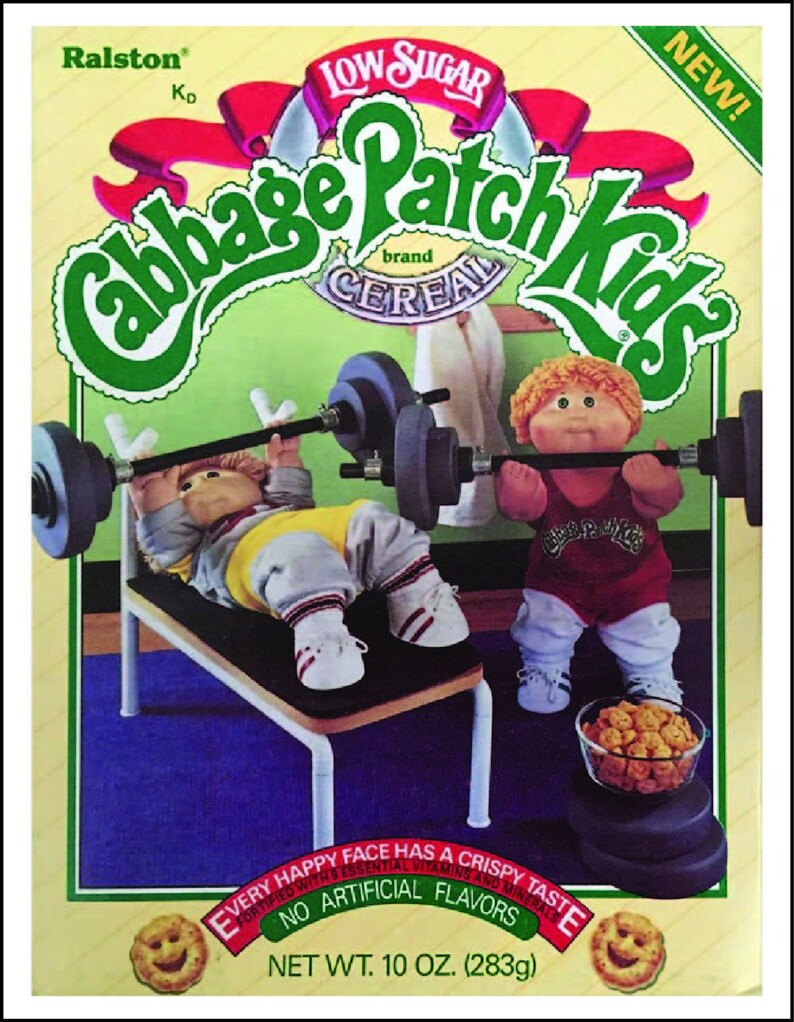 May include: A box of Cabbage Patch Kids cereal with a low sugar content. The box features two Cabbage Patch Kids dolls lifting weights. The text on the box reads "Cabbage Patch Kids" and "Low Sugar". The cereal is 10 ounces (283 grams).