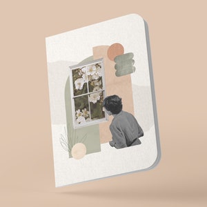 May include: A white notebook with a collage of abstract shapes and a person looking out a window with white flowers. The shapes are in shades of green, brown, and orange.
