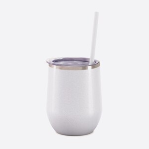 May include: A white glittery stainless steel tumbler with a rounded shape, featuring a clear plastic lid and a straight white straw inserted through the top. The exterior has a subtle sparkling finish and a metallic rim around the opening.