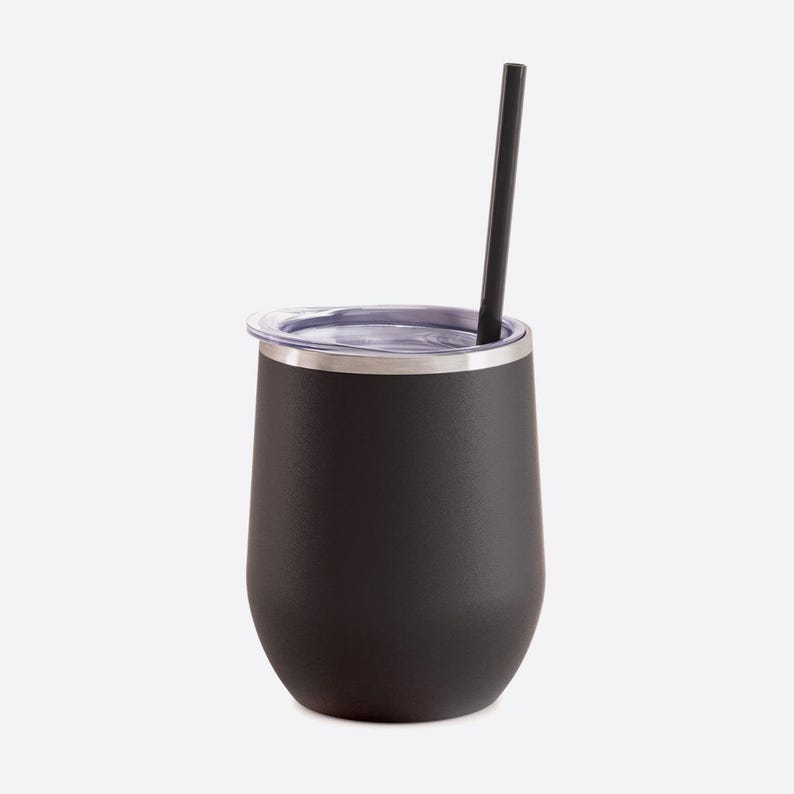 May include: A matte black stainless steel tumbler with a rounded base and a clear plastic lid. A straight black straw is inserted through the lid opening. The tumbler features a smooth, solid-colored exterior finish and a metallic silver rim.