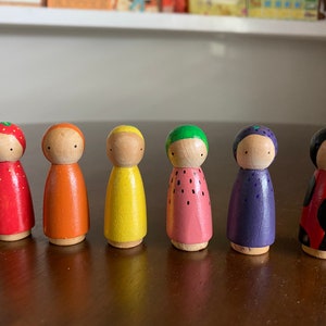 Fruit and Ladybug peg dolls