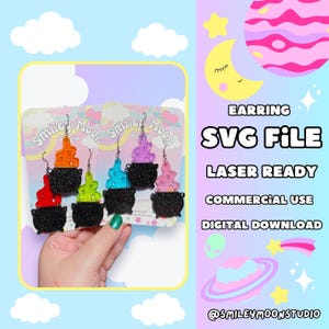 May include: Five pairs of cauldron earrings with glitter accents. The earrings are on cards with the text "Smiley Moon Studio".