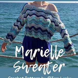 May include: A long-sleeved crochet sweater featuring a wavy chevron pattern in shades of navy blue, light blue, teal, and silver, accented with shimmering sequins. The text Marielle Sweater Crochet Pattern by @Iam.Lanka is visible.