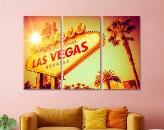 May include: A three-panel canvas print featuring a vintage-style image of the iconic "Welcome to Fabulous Las Vegas" sign with palm trees in the background.