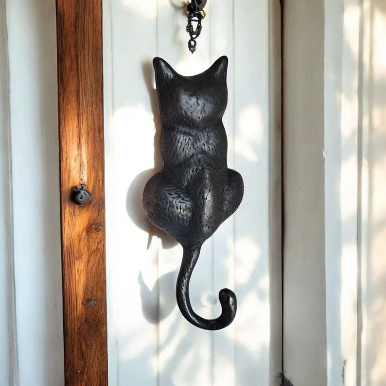 Elegant brass cat design door knocker in antique style