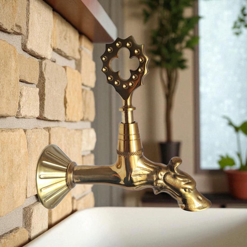 Handmade vintage reproduction faucet mounted on wall