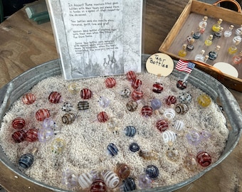 one dozen randomly selected small tear bottles