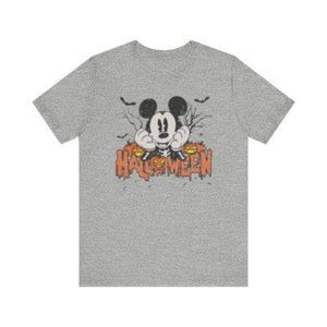 May include: A gray t-shirt with a vintage-style image of Mickey Mouse peeking out from behind a jack-o-lantern. The text "HALLOWEEN" is printed below Mickey Mouse.