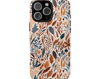 May include: A white phone case with a floral pattern in shades of brown, blue, and cream. The case has a cutout for the camera lens.
