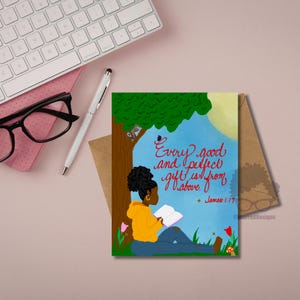 May include: Greeting card with an illustration of a person reading under a tree, with the text "Every good and perfect gift is from above" and James 1:17. The card is on a desk with a keyboard, glasses, and a pen.