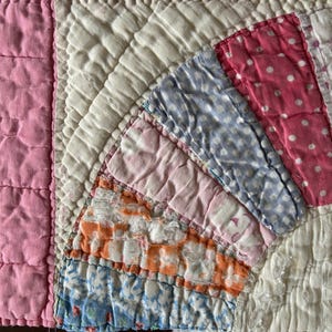 Brightly colored vintage fan quilt piece, crafting and sewing projects, home decor, upcycling, repurposing.