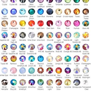 May include: A color reference chart featuring a grid of circular rhinestones in various shades including crystal, jet black, sapphire, emerald, topaz, rose, and fuchsia. Each stone is labeled with its specific color name, including AB finishes.