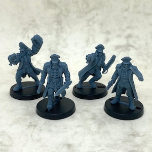 May include: Four grey miniature figurines of soldiers in military uniforms, each on a black circular base. The soldiers are in action poses, some holding weapons like guns and a chainsaw, others with fists raised or holding swords.