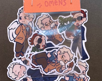 May include: A set of Good Omens stickers featuring various characters from the book and TV series. The stickers are colorful and feature a variety of expressions.