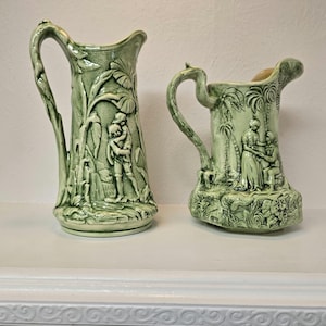 Vintage Green Relief Pottery Pitchers – Embossed Ceramic Jugs with Romantic Scenic Design – Decorative Antique-Style Water Pitchers