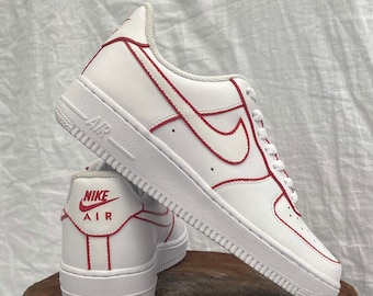 white and red air force 1s