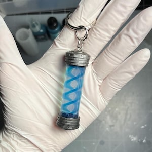 Mecha Man&#39;s (Robert Robertson) Astral Pulse Keychain version from Dispatch game