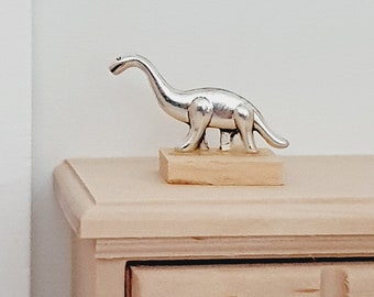 Dolls House Small Dinosaur Ornament on a wooden stand, 1:12th Scale, Miniature cat on a stand