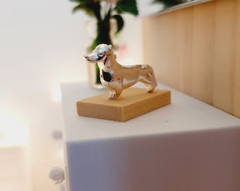 Dolls House Small Sausage Dog Ornament on a wooden stand, 1:12th Scale, Miniature dog on a stand