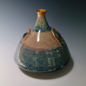 Bouteille de sable et de coquillage