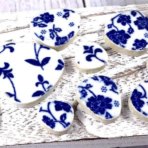 Ceramic pieces for mosaic, about 15 - 17 pcs, .70 - 1.25" blue and white rounded triangles, mix sizes glazed pottery mosaic tesserae (B0072)