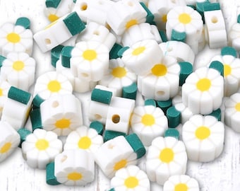 50 polymer clay daisy with leaf beads, ~10x8mm with 1.5mm hole, white w/ yellow center (C0126)