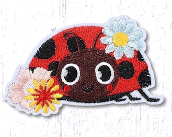 Ladybug with flowers patch, 51x76mm/2x2.9" iron-on applique with embroidered ladybird and pastel florals