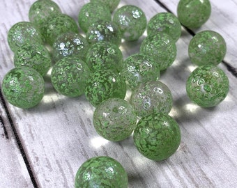 Glass glitter bomb collector marbles, .6 inch semi-transparent green marbles, 16 mm marbles with color specks for games and crafts, 25 pcs