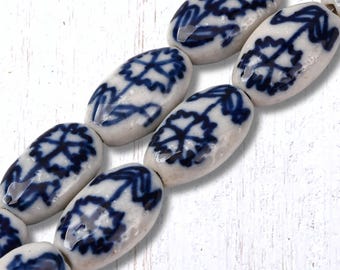 Blue and white porcelain flower beads, 22 pcs, 17.5x11 mm flat oval beads with folk art carnation design, hand painted, 1.4mm hole (C0125)