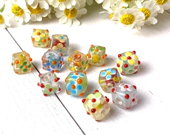 12 lampwork flower beads, approx. 10x10x10mm cushion cubes with enamel flowers, assorted colors with 4-petal flowers, limited (A0039)